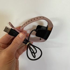 Fitbit pink with changer
